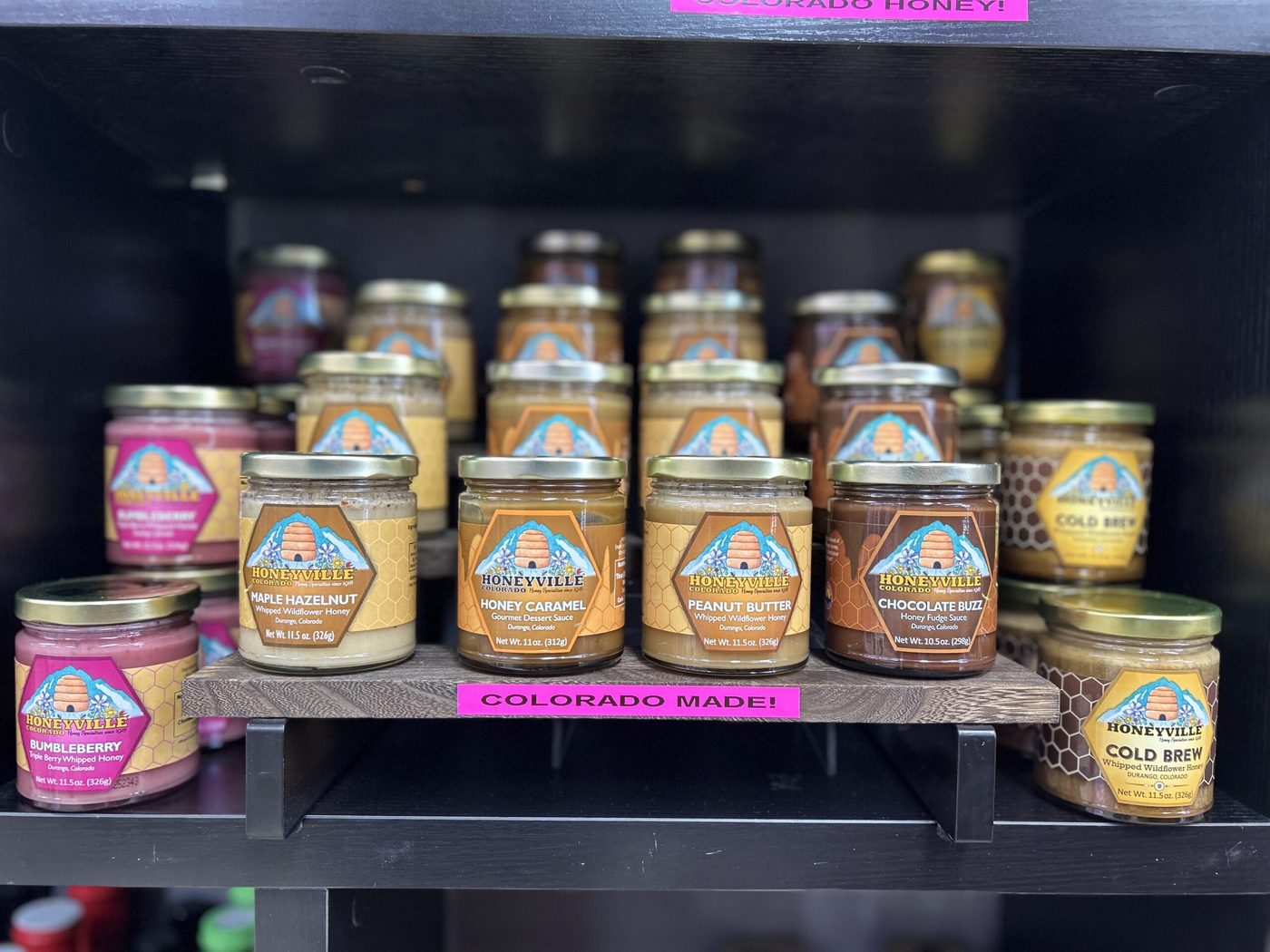 Jars of Colorado honey on the shelf at Missy Kay's